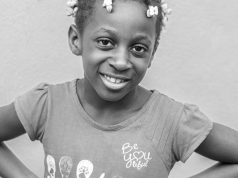 After my mom died, I found an album – In 1 photo, a girl stood beside me, looking exactly like me